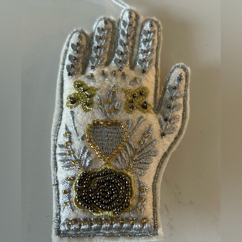 West Elm Beaded Hand Ornament/Decor featuring glass beads, fabric, and thread.